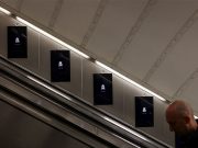 Man in escalator_ER state funeral