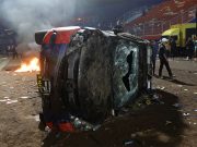 Stampede, riot at Indonesia soccer match kill 129, police say