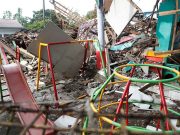 Indonesian rescue workers race to find victims trapped by deadly quake