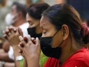 Manila archdiocese urges churchgoers to keep face masks on