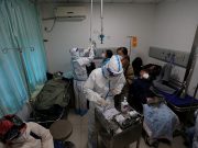 Chinese hospitals ‘extremely busy’ as COVID spreads unchecked