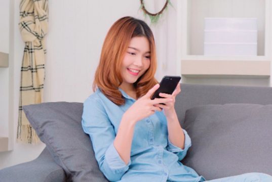 Woman using smartphone