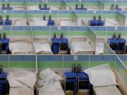 China races to install hospital beds as COVID surge sparks concern abroad