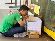 Library exec gives free books to electrician browsing book sale John Silva_Facebook