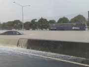 New Zealand’s Auckland expected to receive further rains as flooding remains