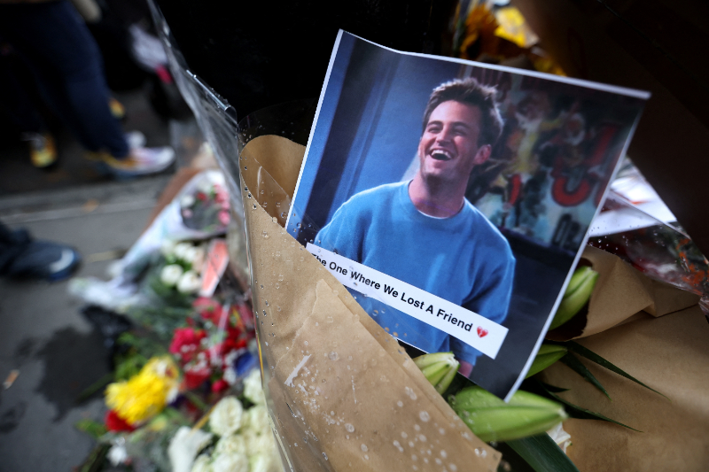 Fans Honor Matthew Perry with Tributes at Chandler Bing's N.Y.C. Apartment