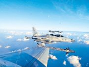 China says Philippines ‘stirs up trouble’ in South China Sea with joint air patrol Air patrol