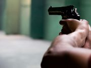 ‘Nagpahinga lang tapos binaril?’: Guard’s shooting of resting worker sparks concerns Man holding a gun