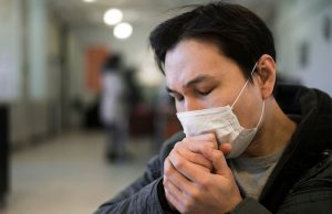 Coughing man