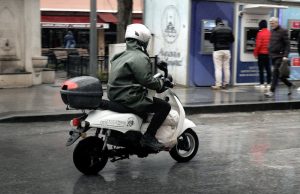 Motorcycle rider in rain