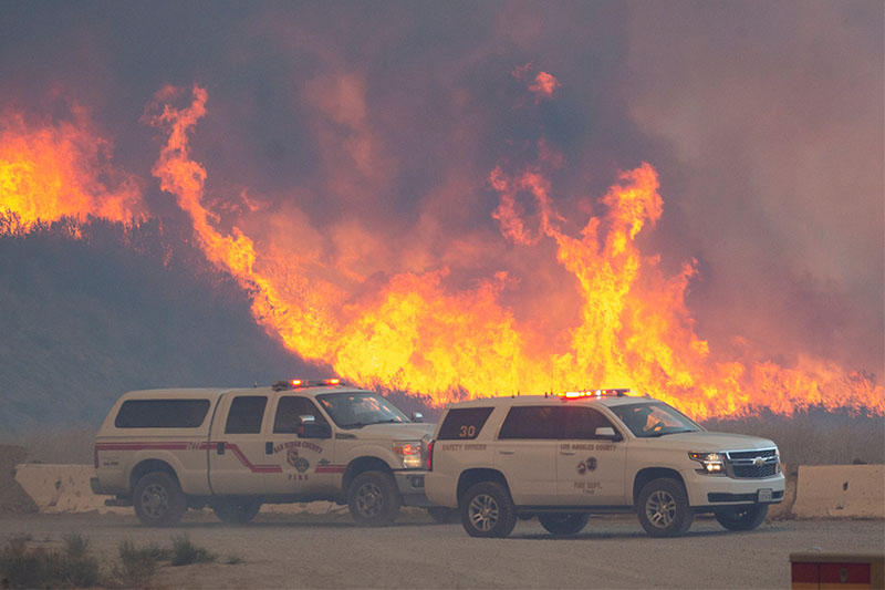 New wildfire near Los Angeles explodes to 9,400 acres, forces evacuations