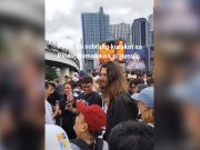 Foreigner resembling ‘Jesus Christ’ draws attention at anti-corruption rally