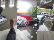 Watch: Drivers sit on the roofs of their cars as floods hit QC last weekend