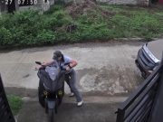 Motorcycle rider pinned to the ground as she tries to roll bike down the driveway in Bukidndon