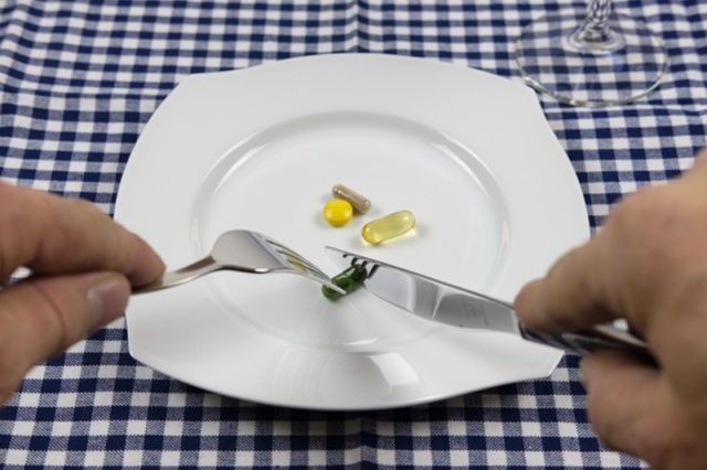 pills-supplements-tablet-capsule-intake
