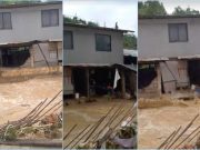 Watch: Eroding house begins sliding as floodwaters rage in Consolacion, Cebu