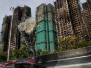 Hong Kong tower fire toll rises to 128, 200 remain missing