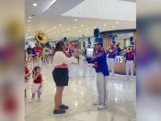 Boyfriend proposes to his partner at shopping mall event