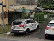 Spotlight on abandoned Fairview car as authorities remove it after 12 years