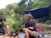 Python slithers behind tourists having picnic at Laguna waterfall
