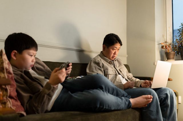 Parent and child using gadgets