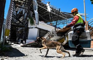 Rescuers race to reach trapped after powerful quake in Mindanao