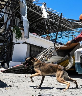 Rescuers race to reach trapped after powerful quake in Mindanao